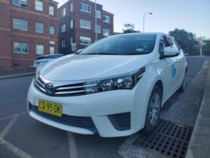 Picture of Uber Carshare City’s 2014 Toyota Corolla 